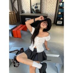 Chân váy xếp ly phối ren THE L STUDIOS